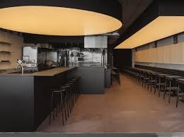 Key design elements in a restaurant's interior including furniture and lighting.